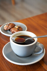 Fototapeta premium Hot Americano, captured on May 20, 2025. A smooth and bold espresso-based coffee with hot water, offering a clean, rich flavor and deep aroma