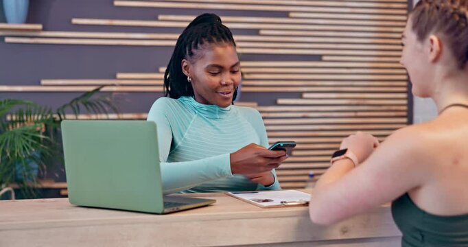 Women, gym and receptionist with pos machine or smart watch for payment or membership fees at front desk. Female people, employee or customer with wristwatch for wireless transaction at health club