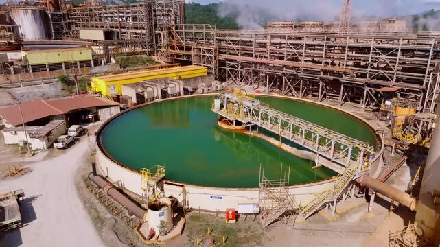 Green clarifier pool with toxic waste water to gain silver and goold, aerial
