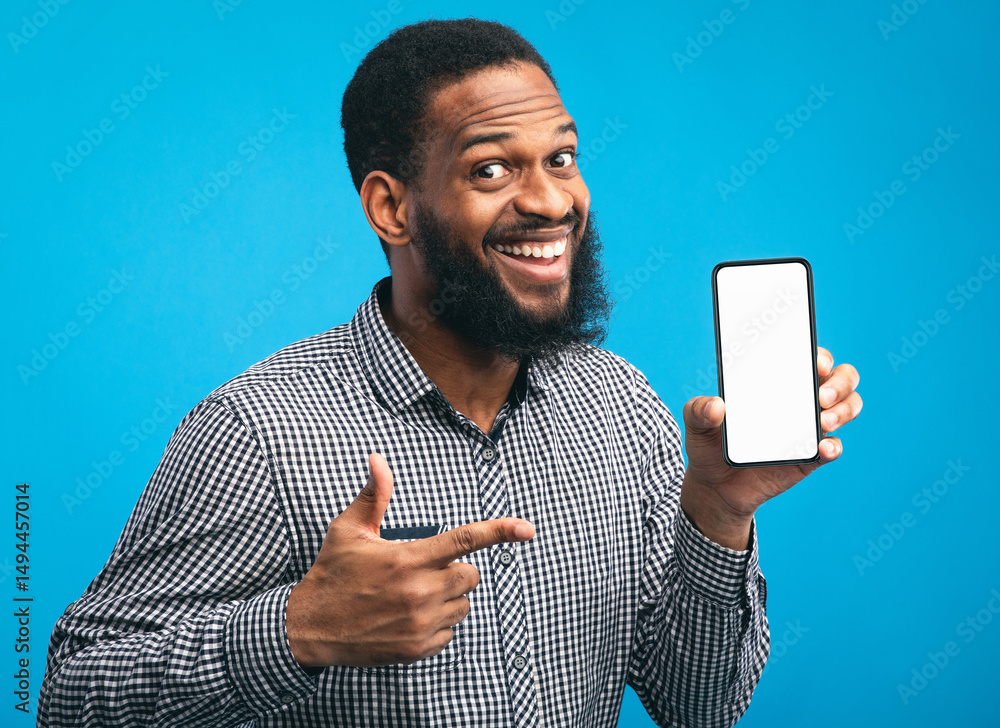 Poster Useful App Or Website. Black man pointing at blank cell phone screen for advertising text, empty space, mock up