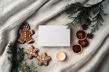 A flatlay composition of a Christmas scene on a white textured background