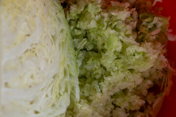 close-up of shredded and quarter cabbage