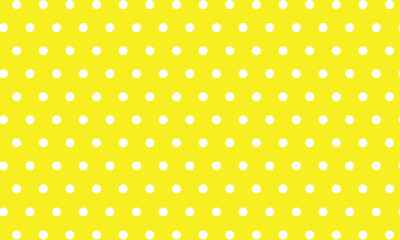 abstract white polka dot pattern on yellow.