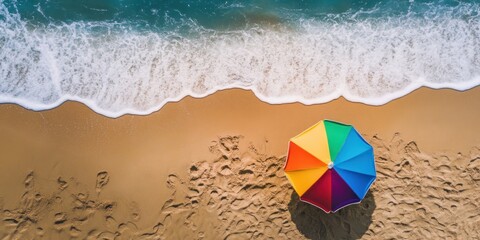 Obraz premium Rainbow Beach Umbrella Aerial View: Summer Vacation Paradise