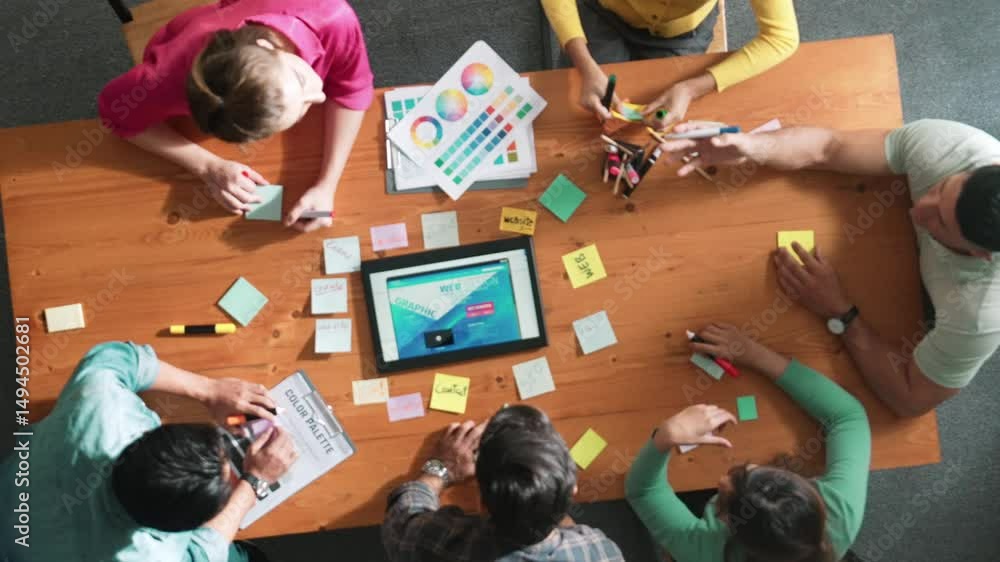 Poster top view of skilled business people working together to design web design. aerial view of designer b