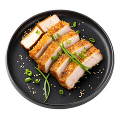 Crispy roasted pork belly slices on a black plate top view on white background