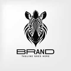 Fototapeta premium Zebra head logo design with stylized stripes and facial features. Front facing portrait in black and white.