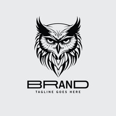 Owl logo design for a brand in a simple, bold graphic style. Intense owl head illustration in black and white on a plain background.