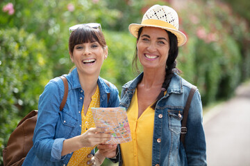 middle aged women hiking through countryside