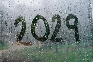 Number 2029 on Foggy Rainy Window.

