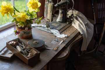 Florals and Thread on a Rustic Sewing Table