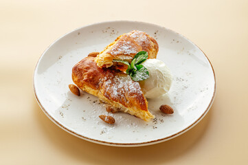 ice cream and pastry dessert with almonds and mint