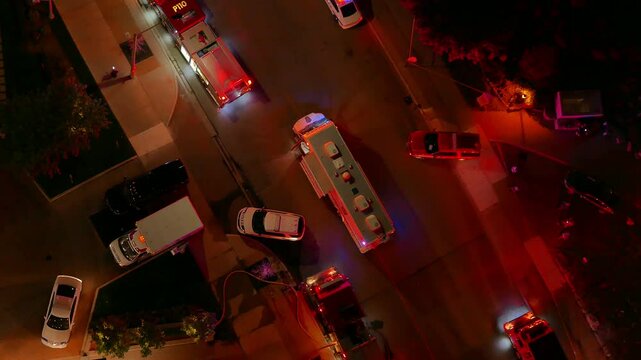 Emergency response and at the scene of an incident in an urban residential area at night. As viewed from a high-rise in distress on September 12, 2016 in Mississauga, Canada.