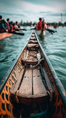 Dragon boat racing. Close-up of dragon statue, hull, people rowing