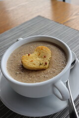 moshroom soup in a white bowl 