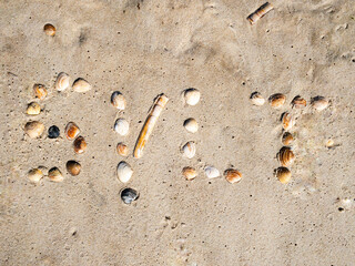 Name of Island Sylt formed with mussels in sand