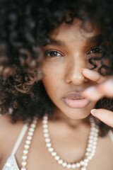 Afro Style Portrait of a Confident Fashionista Laughing with Glamour and Attitude. Smiling.