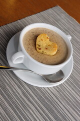 moshroom soup in a white bowl 