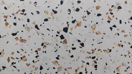 Close-up of a marble surface with patterns, ideal for use as a background, texture, or design element in architecture and interior decor.