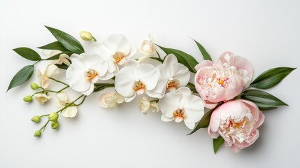 A delicate arrangement showcases white orchids accented with light pink peonies and lush green leaves against a clean white background offe gentle beauty.