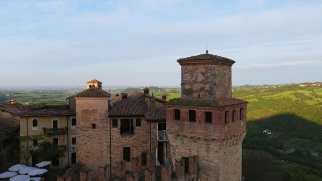 Borgo di Vigoleno - Historic Stone Castle With Towers In Vigoleno, Piacenza, Italy. pullback drone shot