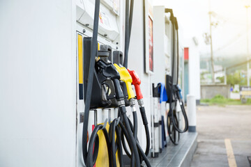 Gasoline station prepare for traveller fill to tank  near  shop and sun light.