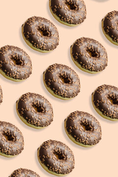 Abstract chocolate donuts background isolated