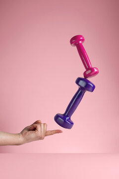 Abstract fitness, workout concept, weights dumbbells  levitating