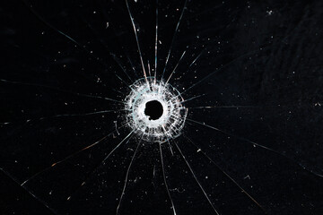 Bullet holes on black glass, overlay design background