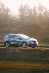 SUV moving on paved road