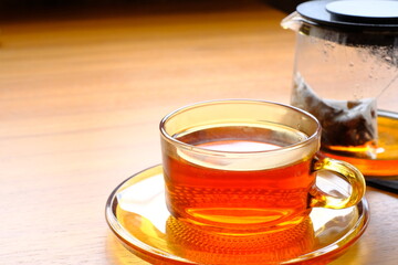 cup of tea on wooden table	