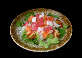Japanese sashimi salad with assorted raw fish and greens