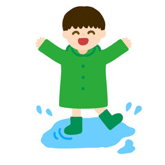 水たまりで遊ぶ男の子