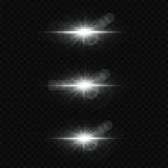 Obraz premium Bright white glare of light with lens reflection, star flash.