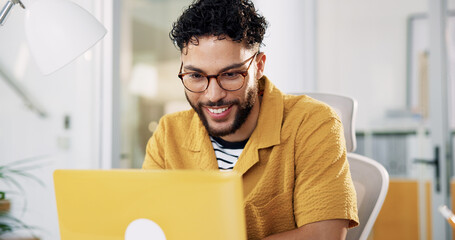 Office, businessman and reading with laptop for creative agency, article information and...
