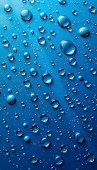 A blue background adorned with numerous glistening water  droplets of varying sizes. 