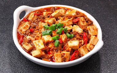 Mapo Tofu or Mapo Doufu is a typical Sichuan dish that is famous for its combination of soft tofu, minced meat and typical spicy spices such as doubanjiang and Sichuan pepper