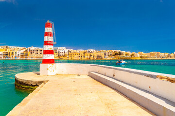 Lighthouse on the pier in Birzebbuga, Malta
