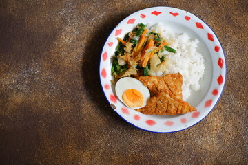 rice and vegetable with eggs and tempeh 