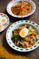 Vegetable with coconut grated seasoning named urap in Bahasa