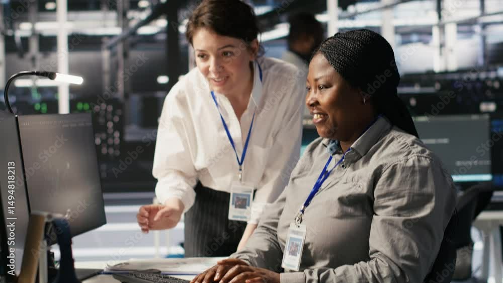 Poster cheerful data center technicians satisfied with results after collaborating on ai automation deploym