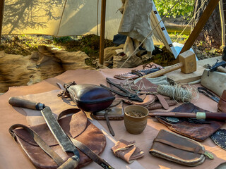 A saddler's workshop, a stand showing the production of leather goods using old methods