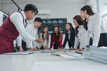 Marketing professionals discussing consumer demographics in a meeting