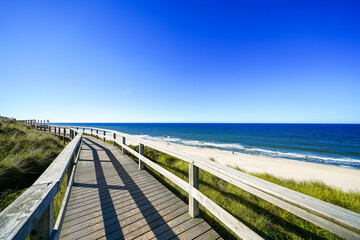 View of the beach on the promenade near Wenningstedt on the North Frisian island of Sylt. Landscape on the North Sea coast.
