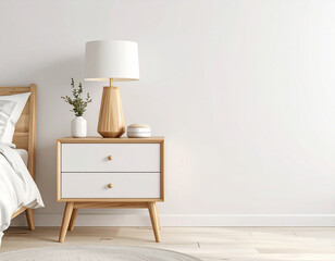 white wood bedside table with modern lamp and small decorative vase against minimalist white wall. Scandinavian bedroom with neatly made bed and neutral tones.