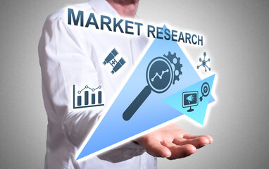 Market research concept above a human hand