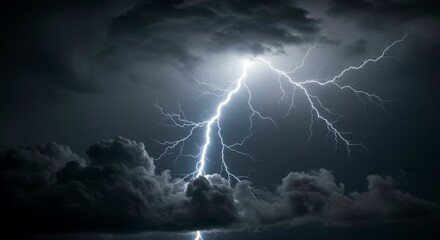 Dramatic lightning strike cuts through dark, stormy clouds, illuminating the night sky with intense, bright light