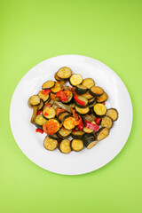 Grilled vegetables on white plate