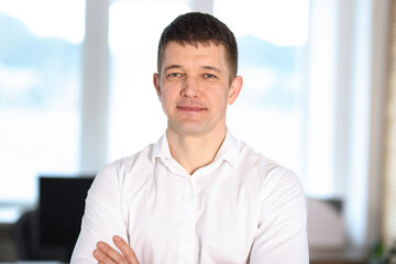 Portrait of handsome middle aged man indoors