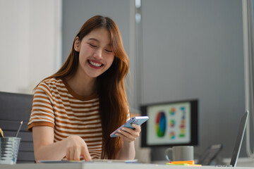 Designer woman thinking ideas strategy about mobile app interface wireframe design with customer...